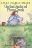 On the Banks of Plum Creek: A Newbery Honor Award Winner - Hardcover